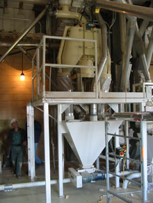 Ferkar mill installed on metal construction.